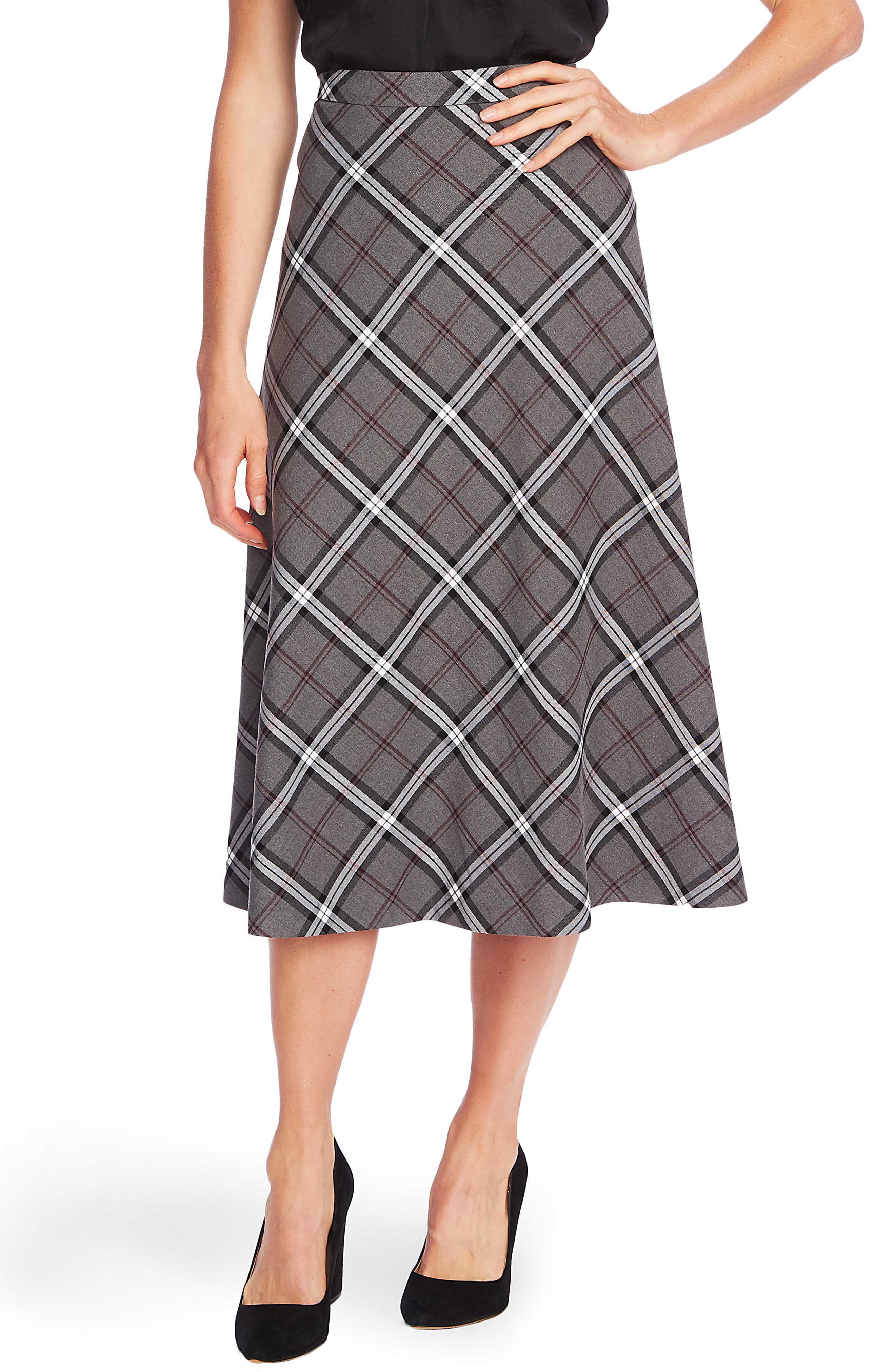 10 Plaid Skirt Outfit Ideas How to Wear a Plaid Skirt This Fall