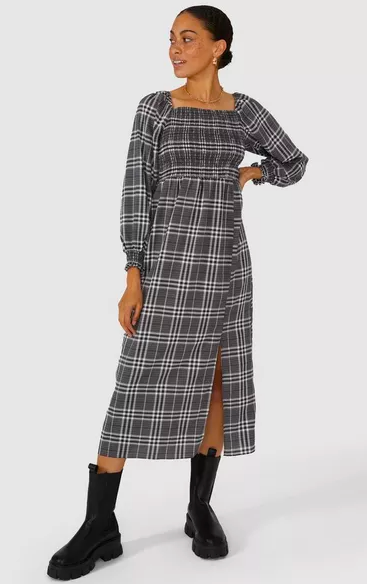 Duchess of Cambridge looks chic in check Zara midi-dress