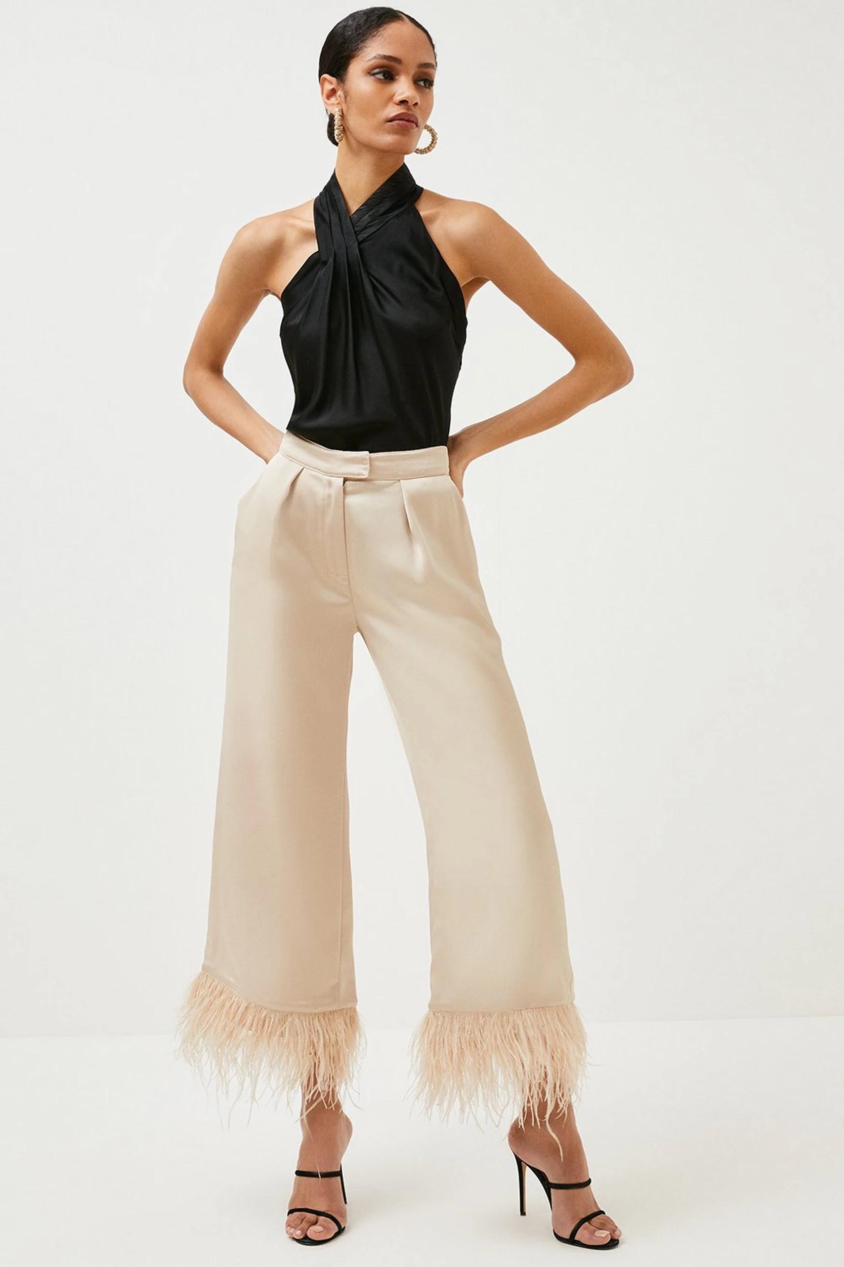 The 19 Best Feather Dresses, Tops, Pants, and Accessories of the 