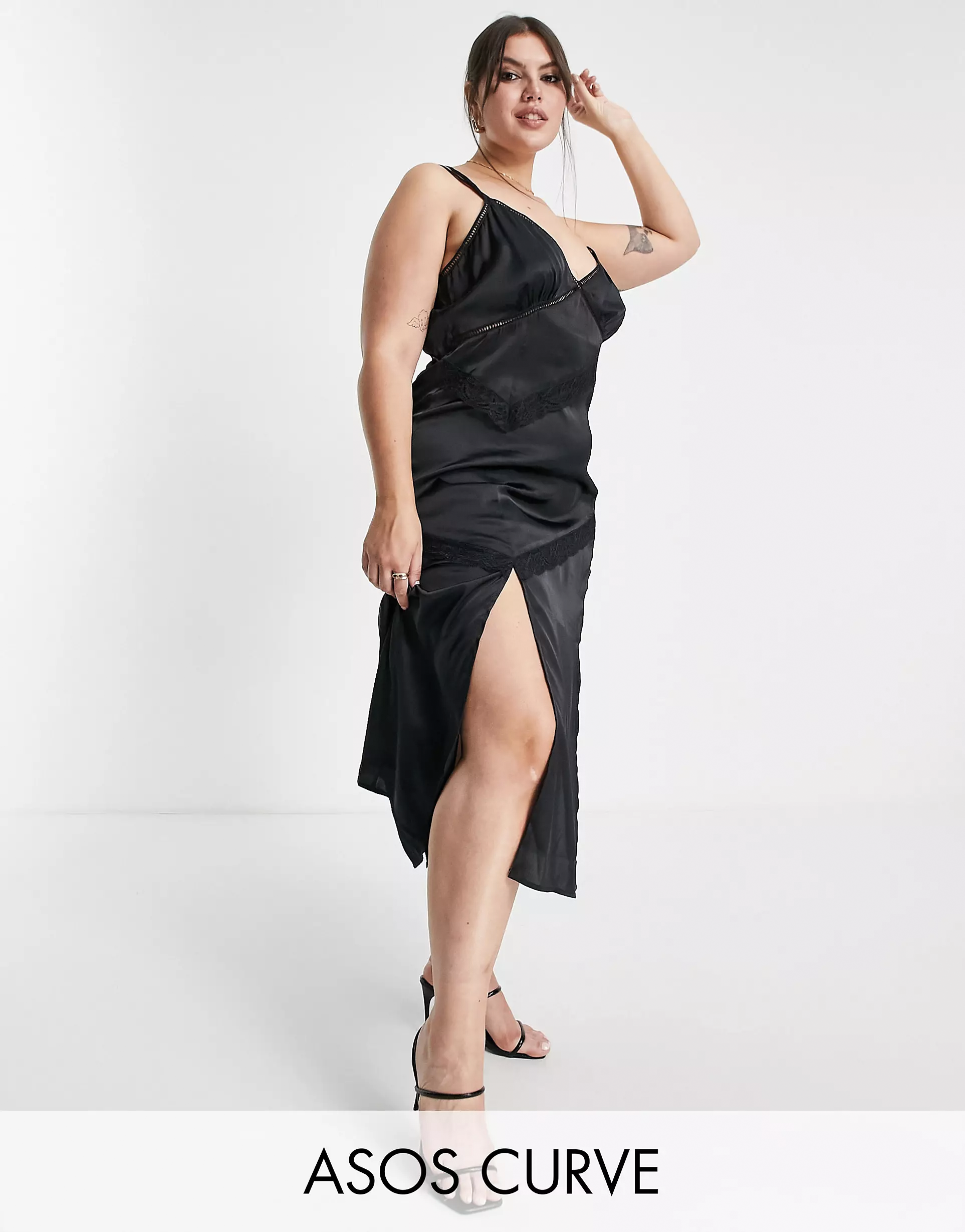 Dua Lipa just wore the perfect black summer party dress