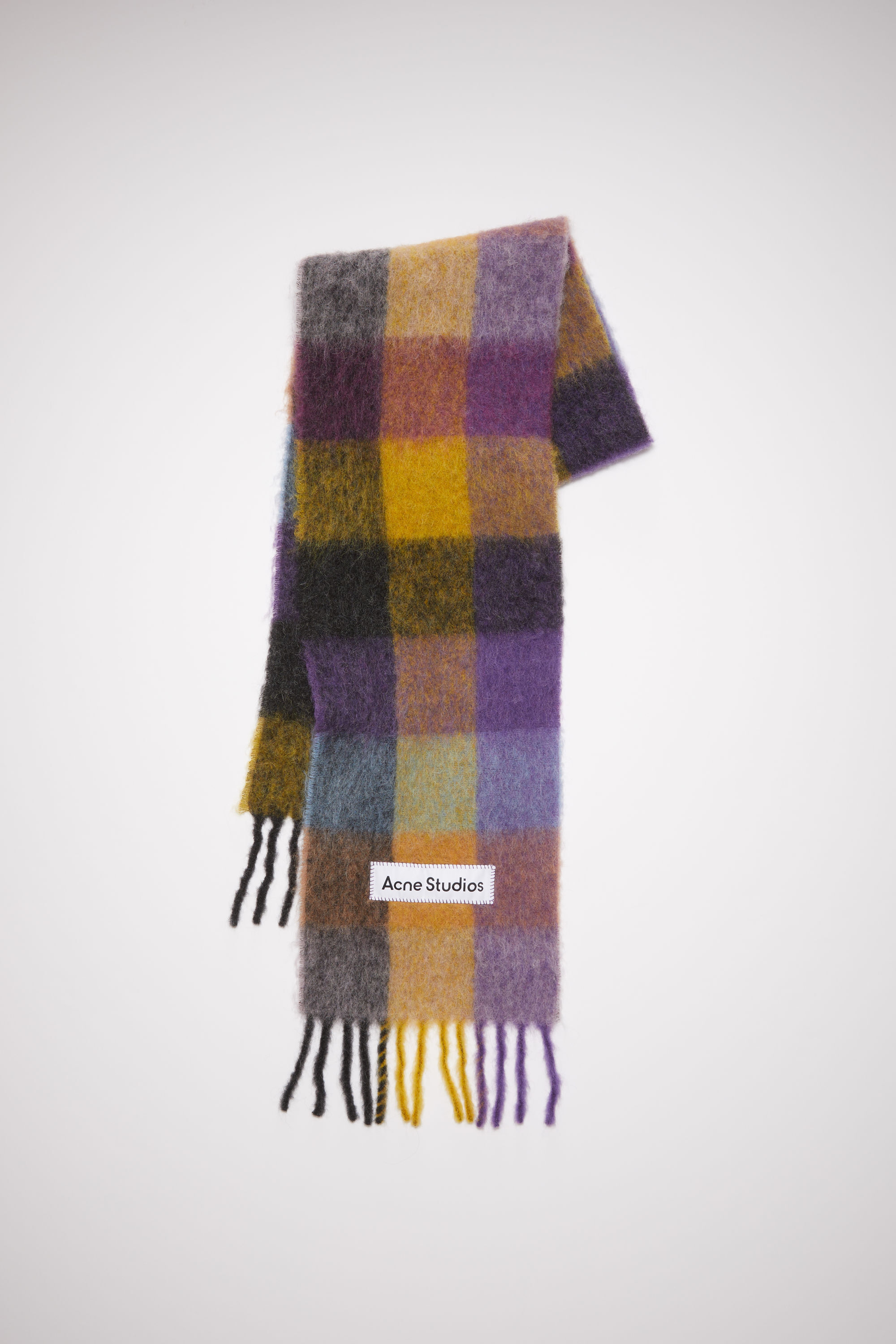 Why the Acne Studios Scarf Is Still a Winter Status Accessory
