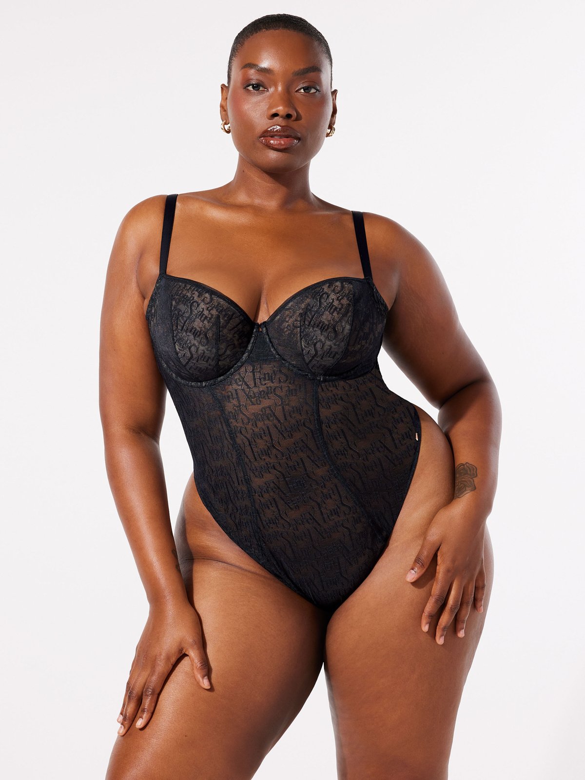 Rihanna Lounges in Sheer Lingerie and Drops 'Signature Script