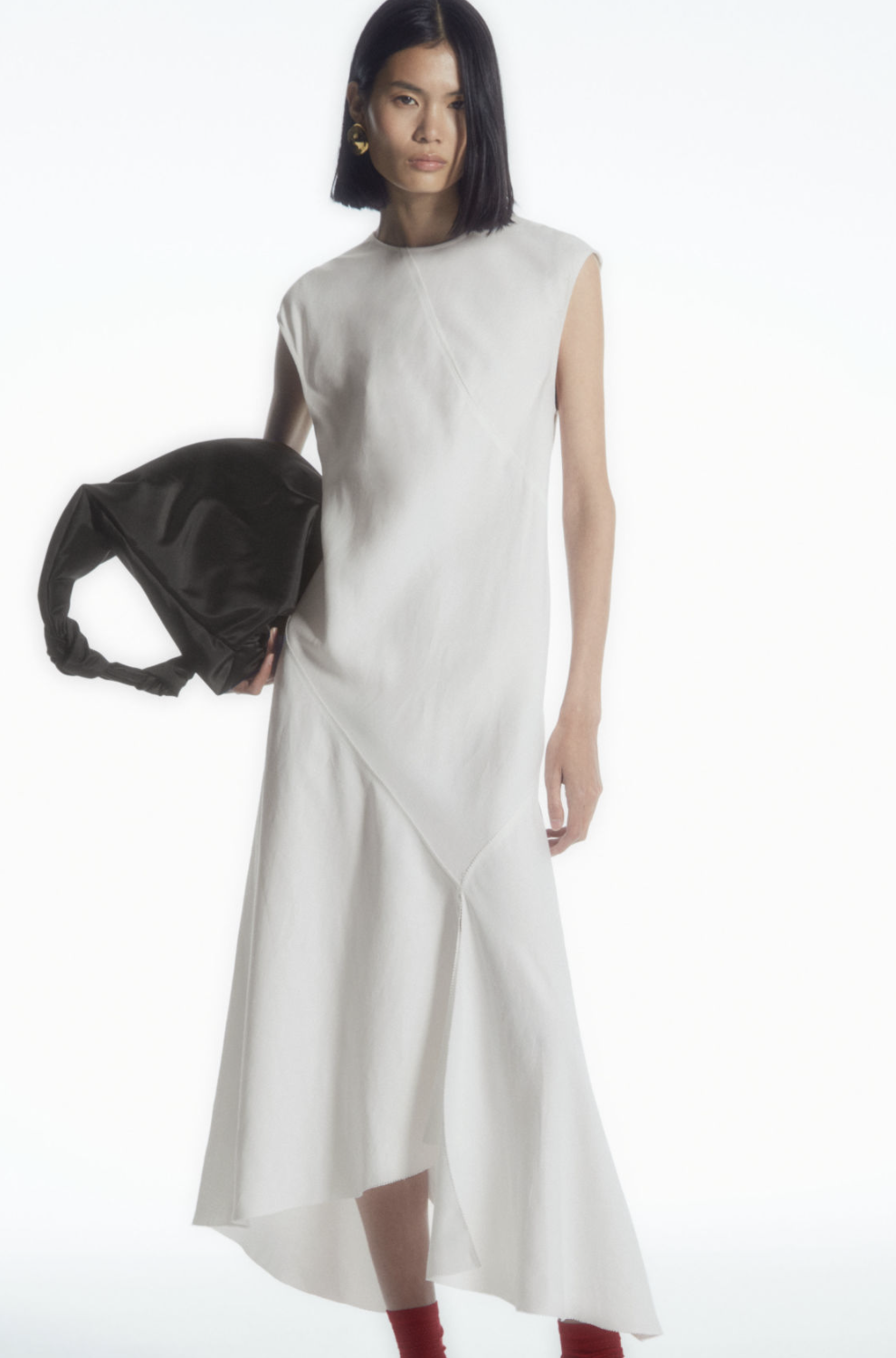 De mooiste witte mouwloze midi-jurken à la prinses Alexia