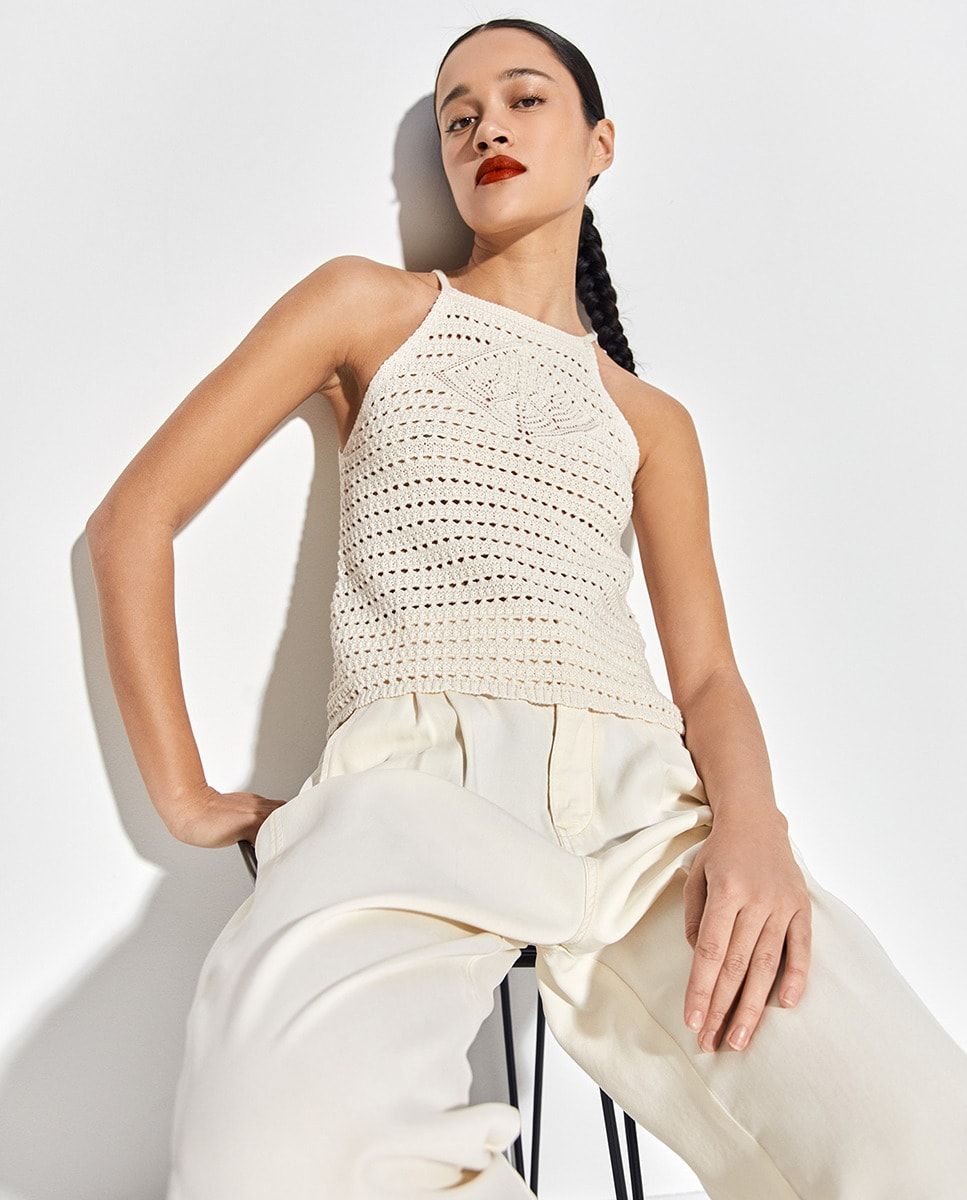 Localizado en Sfera un conjunto boho de top y falda de punto aún