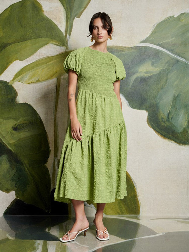 green emerald velvet dress FP Movement Baseline Tennis Dress for Women in Green Glow Combo