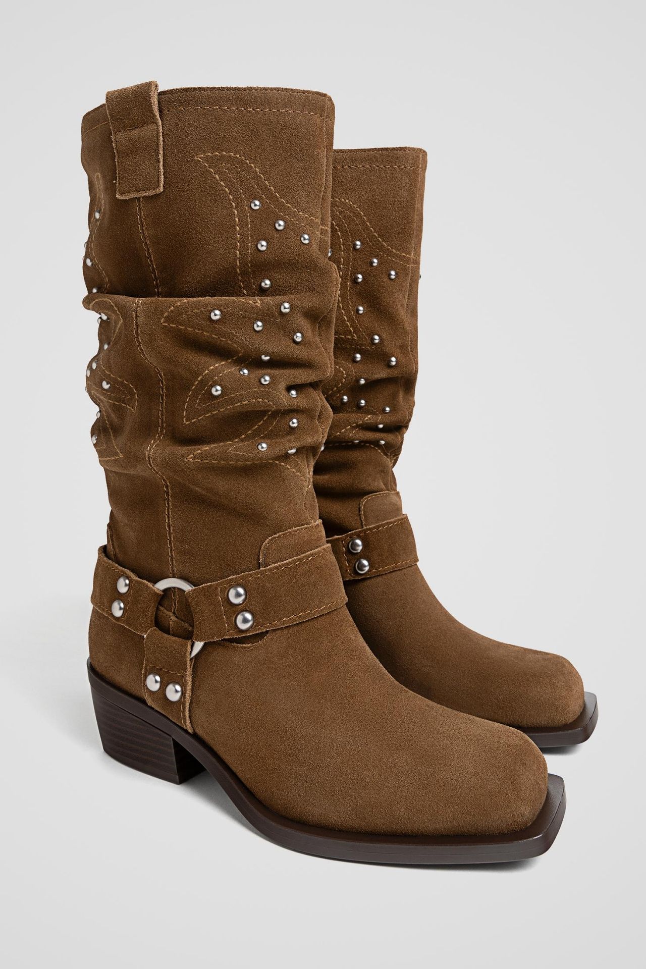 15 botas cowboy para llevar con vestido y falda este otoño 2024