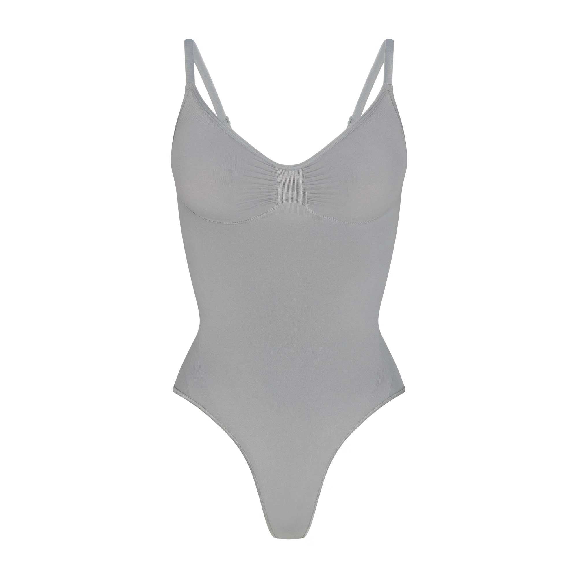 SKIMS::ワンピース[RESALE] Skims Down One Piece (Bodysuit) in Natural | Lyst