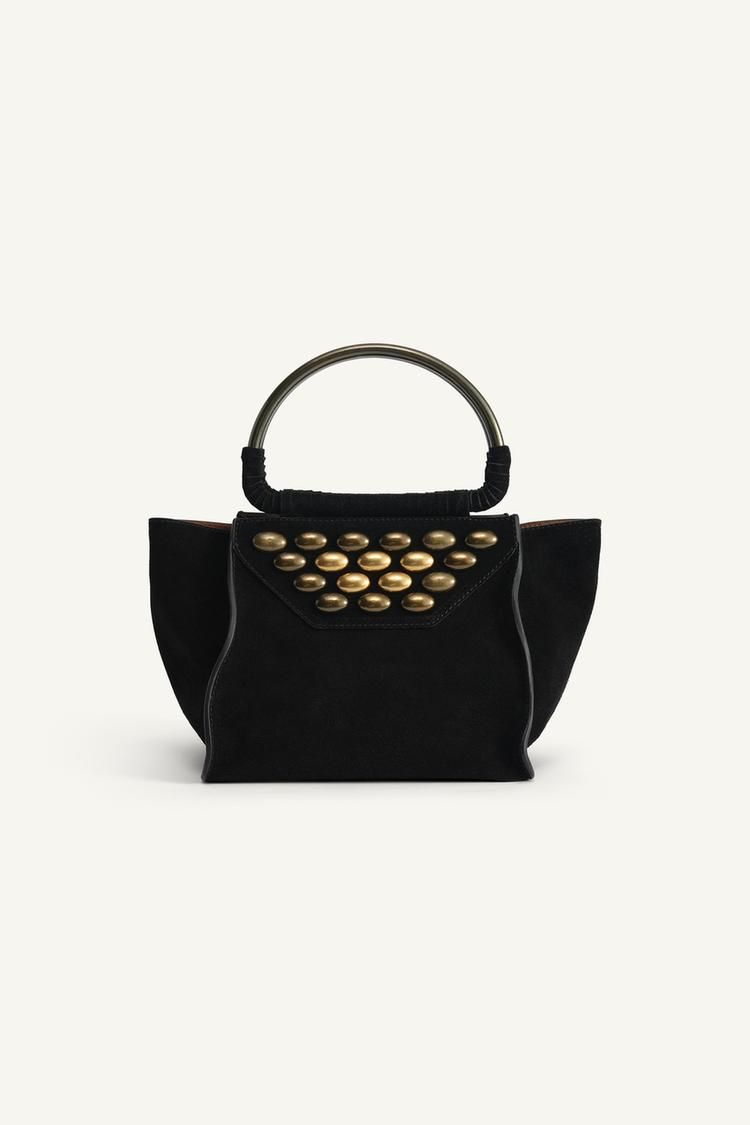bolsos de Zara edición limitada con flecos y tachuelas estilo Isabel