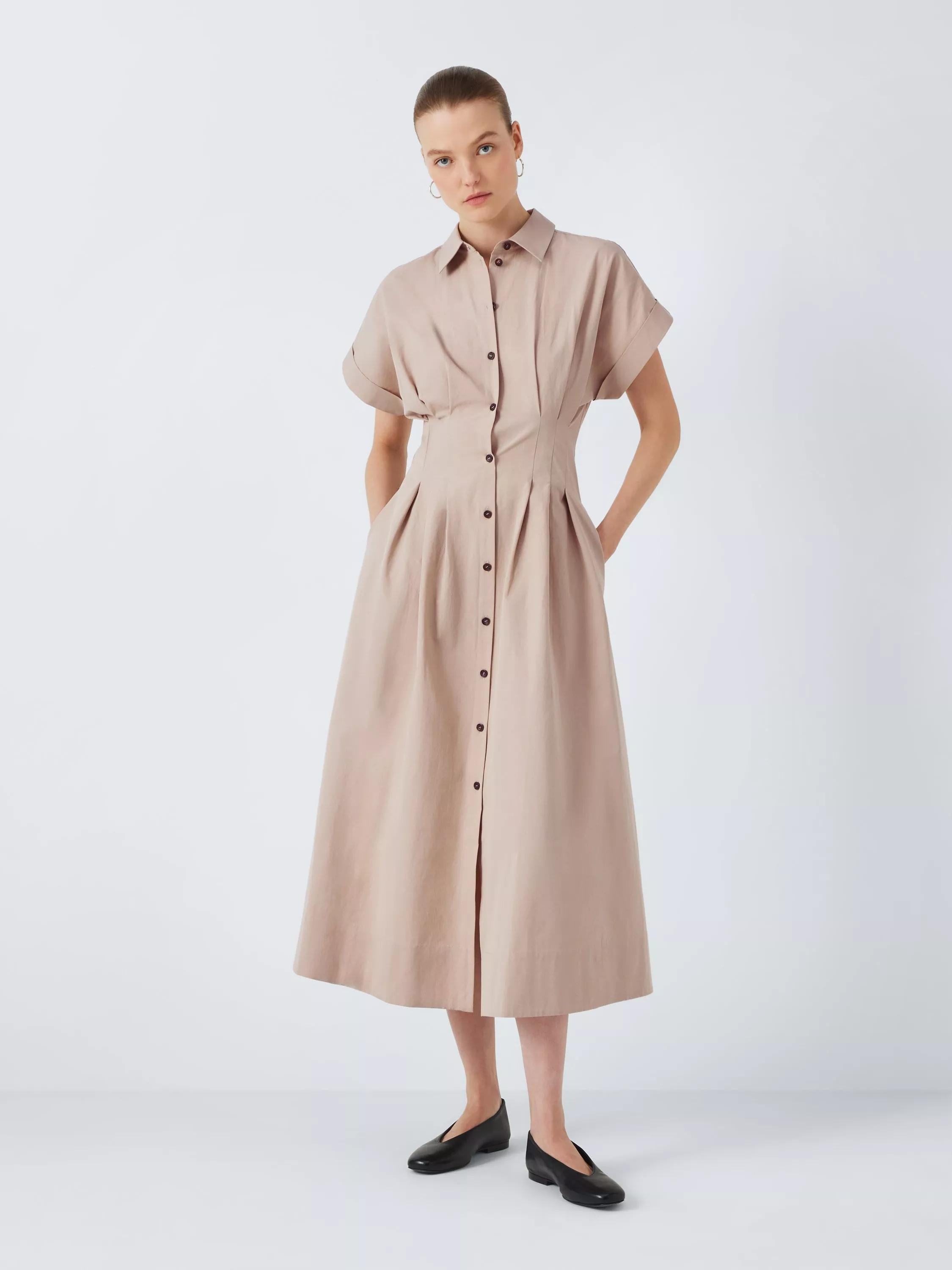 Greta Gerwig sparkles in cinched midi shirt dress
