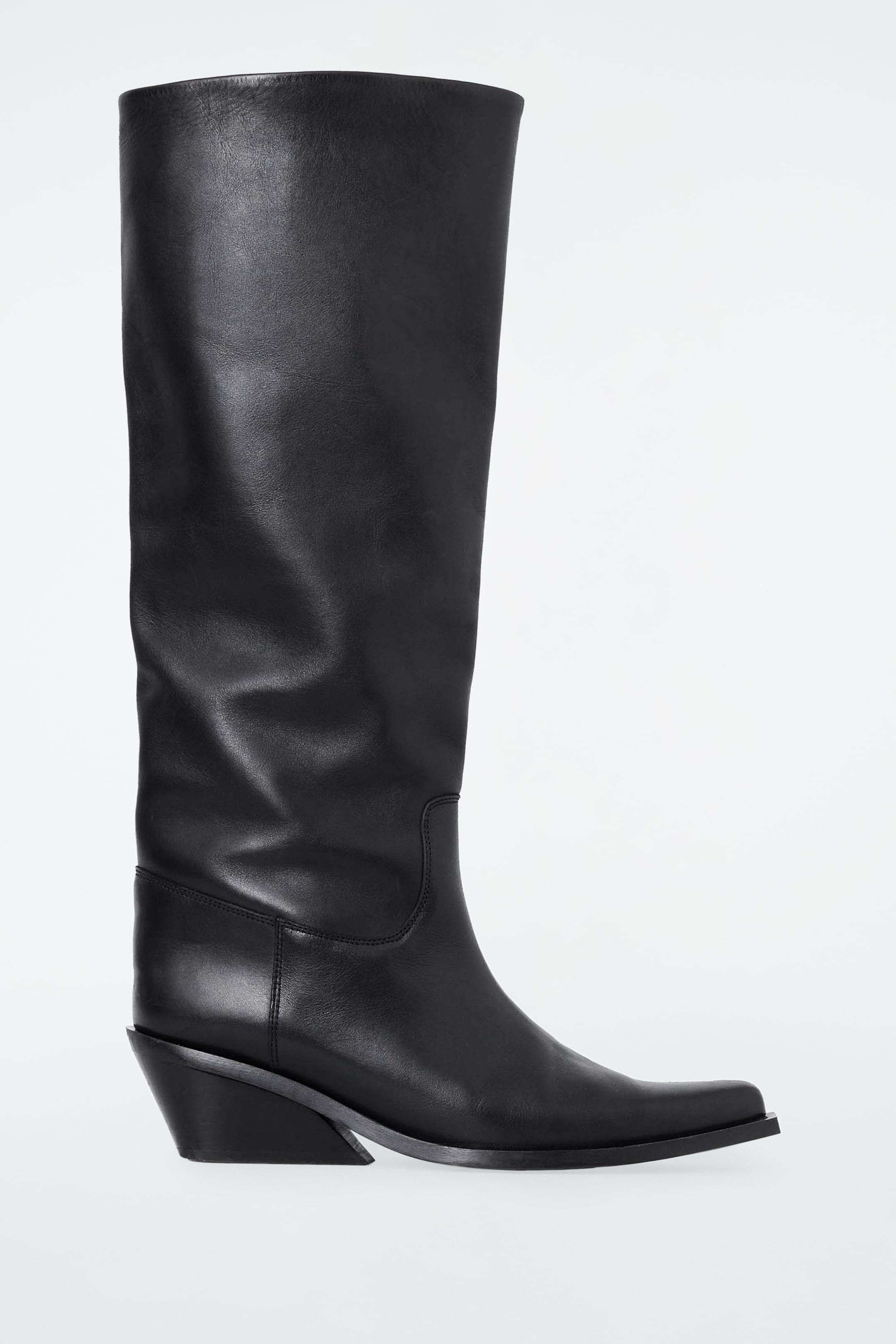 cool ways to wear knee-high boots this autumn, according to the