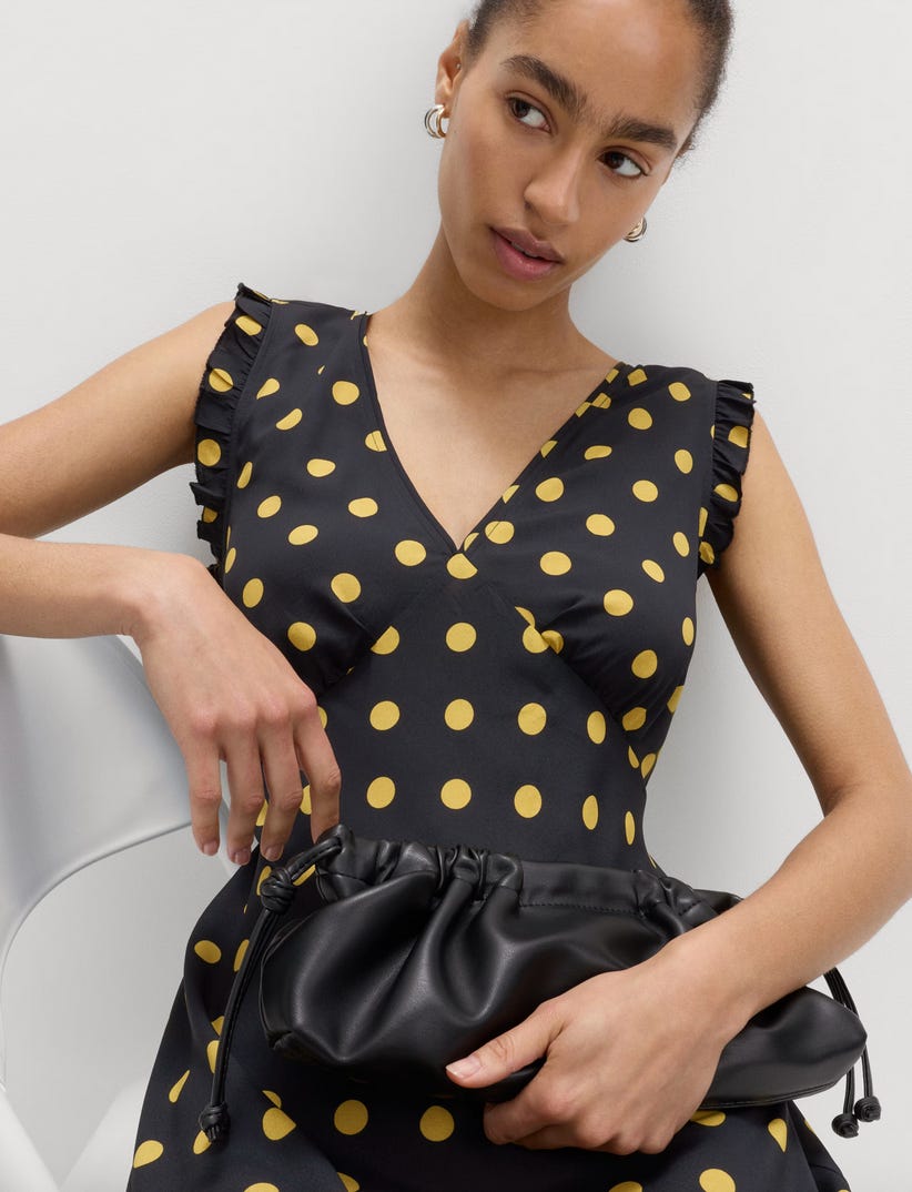 black dress pants with grey suit jacket Black & Gold Polka Dot Ruffle Cut Out Long Train Dress